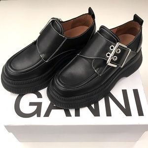 GANNI buckled leather platform loafers